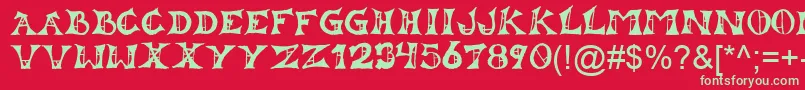 フォントLestat – 赤い背景に緑の文字