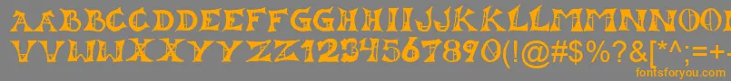 Lestat Font – Orange Fonts on Gray Background
