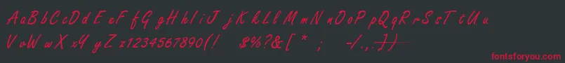 フォントFreestylescriptTNormal – 黒い背景に赤い文字
