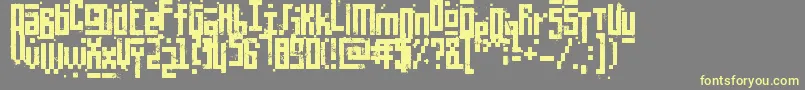 Czcionka PixelicWar – żółte czcionki na szarym tle