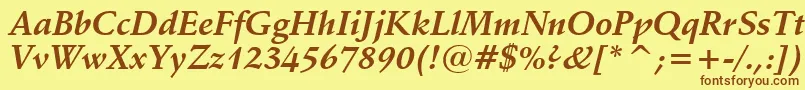 フォントSchneidlerBoldItalicBt – 茶色の文字が黄色の背景にあります。