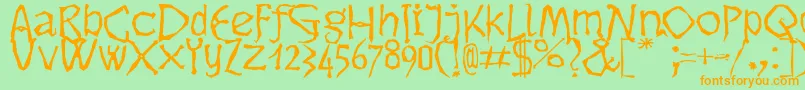 Dikovinac-Schriftart – Orangefarbene Schriften auf grünem Hintergrund