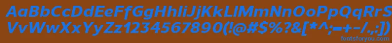 Czcionka UnimanExtrabolditalic – niebieskie czcionki na brązowym tle