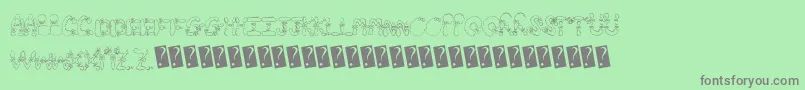 Fonte Hairbows – fontes cinzas em um fundo verde