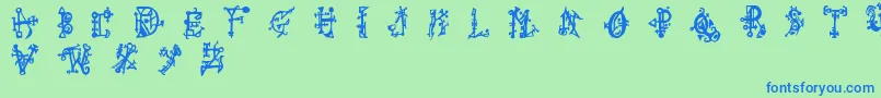 フォントWiqued – 青い文字は緑の背景です。