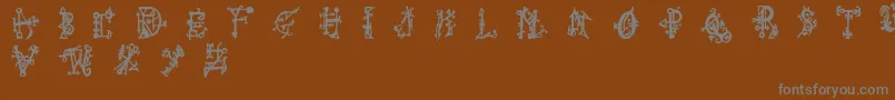 フォントWiqued – 茶色の背景に灰色の文字