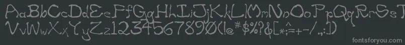 フォントZippittey – 黒い背景に灰色の文字