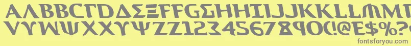 フォントAegisLeftalic – 黄色の背景に灰色の文字