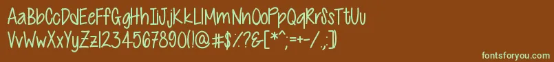 フォントCutiePatootie – 緑色の文字が茶色の背景にあります。