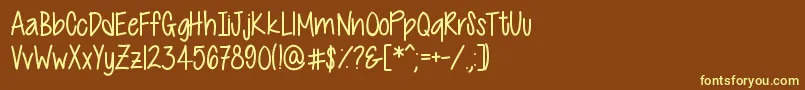 CutiePatootie-fontti – keltaiset fontit ruskealla taustalla