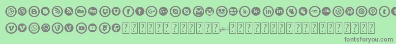 SocialCircles-fontti – harmaat kirjasimet vihreällä taustalla