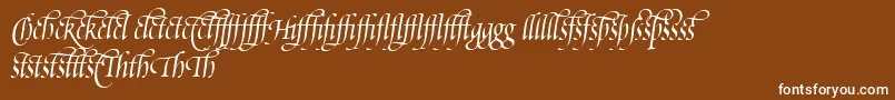 PoeticaSuppLigatures-Schriftart – Weiße Schriften auf braunem Hintergrund