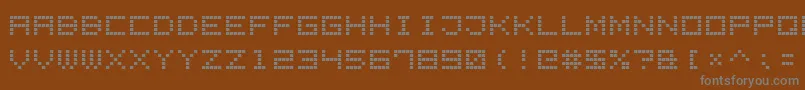 Fonte LedDisplay7 – fontes cinzas em um fundo marrom