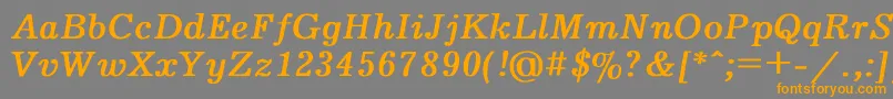 フォントJournal4 – オレンジの文字は灰色の背景にあります。