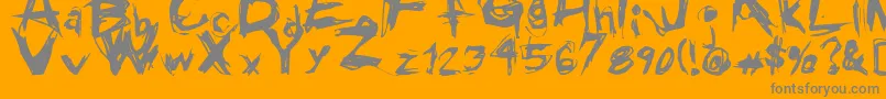 GrungeRegular-Schriftart – Graue Schriften auf orangefarbenem Hintergrund