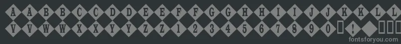 Frootstand-Schriftart – Graue Schriften auf schwarzem Hintergrund