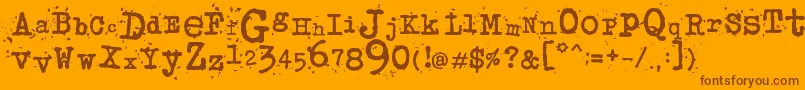 JunkosTypewriterフォントについての詳細 フォントJunkosTypewriter – オレンジの背景に茶色のフォント