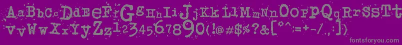 フォントJunkosTypewriter – 紫の背景に灰色の文字
