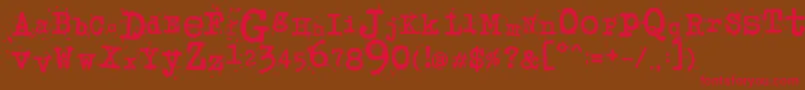 フォントJunkosTypewriter – 赤い文字が茶色の背景にあります。