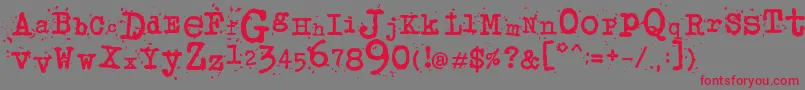 JunkosTypewriter-Schriftart – Rote Schriften auf grauem Hintergrund