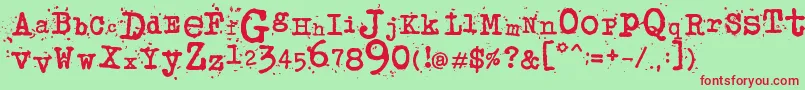 フォントJunkosTypewriter – 赤い文字の緑の背景