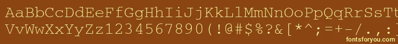Ukrainiancourier-fontti – keltaiset fontit ruskealla taustalla