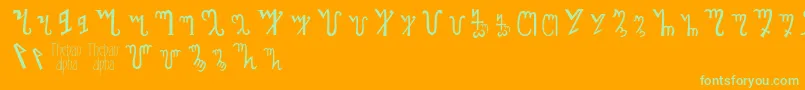 Thebanalphabet-fontti – vihreät fontit oranssilla taustalla