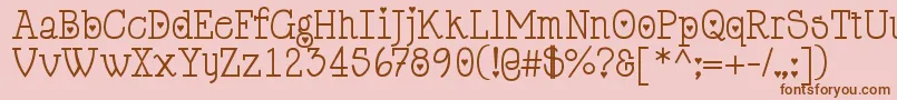 フォントCupiddelocke – ピンクの背景に茶色のフォント