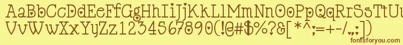 Cupiddelocke-Schriftart – Braune Schriften auf gelbem Hintergrund
