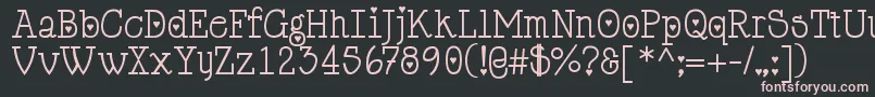 フォントCupiddelocke – 黒い背景にピンクのフォント