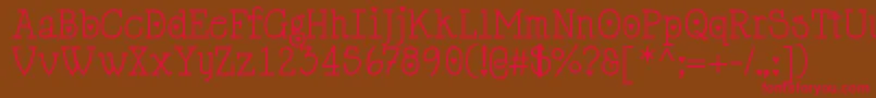 Cupiddelocke-fontti – punaiset fontit ruskealla taustalla