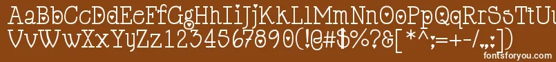 Cupiddelocke-fontti – valkoiset fontit ruskealla taustalla