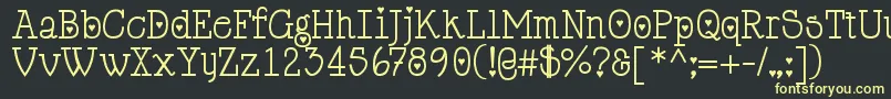 Cupiddelocke Font – Yellow Fonts on Black Background