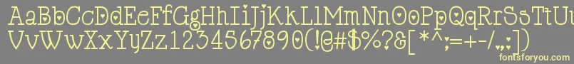 Cupiddelocke-Schriftart – Gelbe Schriften auf grauem Hintergrund