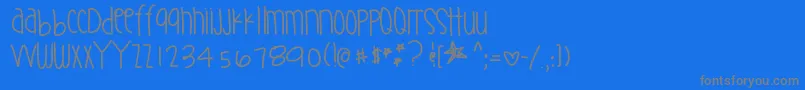 Supernaturalthing Font – Gray Fonts on Blue Background