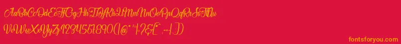 フォントJardinDesBermudes – 赤い背景にオレンジの文字