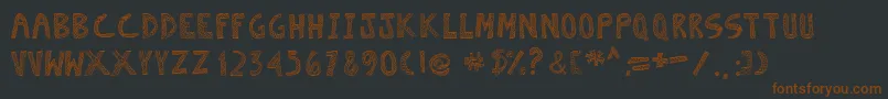 Escaned Font – Brown Fonts on Black Background