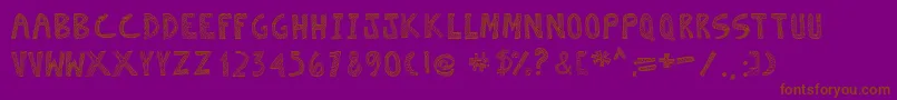 Czcionka Escaned – brązowe czcionki na fioletowym tle