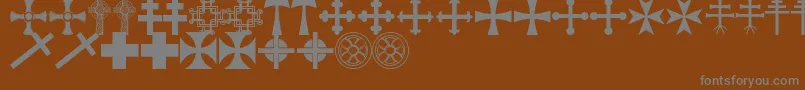 Czcionka CrossbatsTfb – szare czcionki na brązowym tle