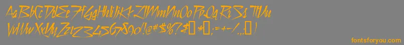 フォントStilltime – オレンジの文字は灰色の背景にあります。