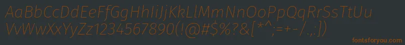 Шрифт FirasansUltralightitalic – коричневые шрифты на чёрном фоне