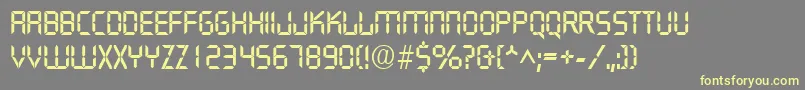 QuartzRegular-Schriftart – Gelbe Schriften auf grauem Hintergrund