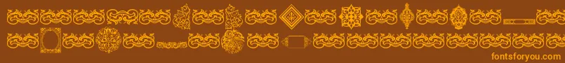 Czcionka VintageDecorativeSigns7 – pomarańczowe czcionki na brązowym tle