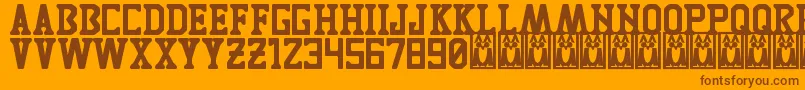 TigresUanl-Schriftart – Braune Schriften auf orangefarbenem Hintergrund