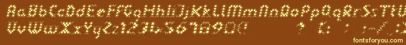LinotypedotOblique-fontti – keltaiset fontit ruskealla taustalla
