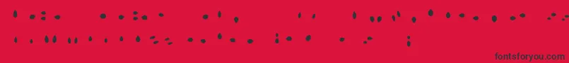 Fonte MisterLoopyLoops – fontes pretas em um fundo vermelho