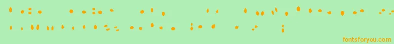 MisterLoopyLoops-Schriftart – Orangefarbene Schriften auf grünem Hintergrund