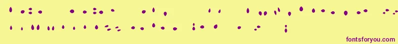 Czcionka MisterLoopyLoops – fioletowe czcionki na żółtym tle