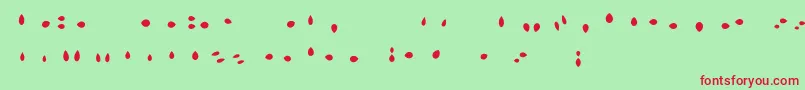 MisterLoopyLoops-Schriftart – Rote Schriften auf grünem Hintergrund