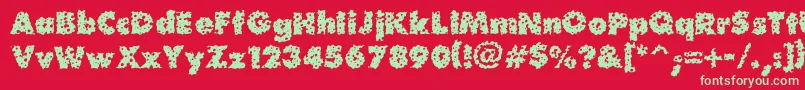 フォントWaterhole – 赤い背景に緑の文字
